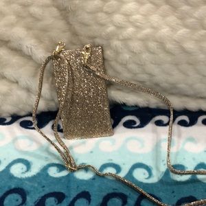 NWOT never used phone charging wristlet gold
